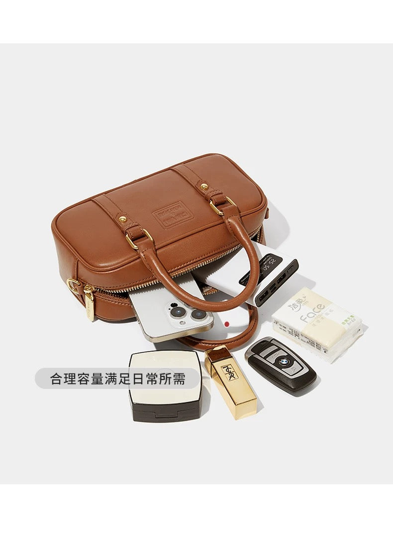 Crossbody bag with a carrying pillow pouch